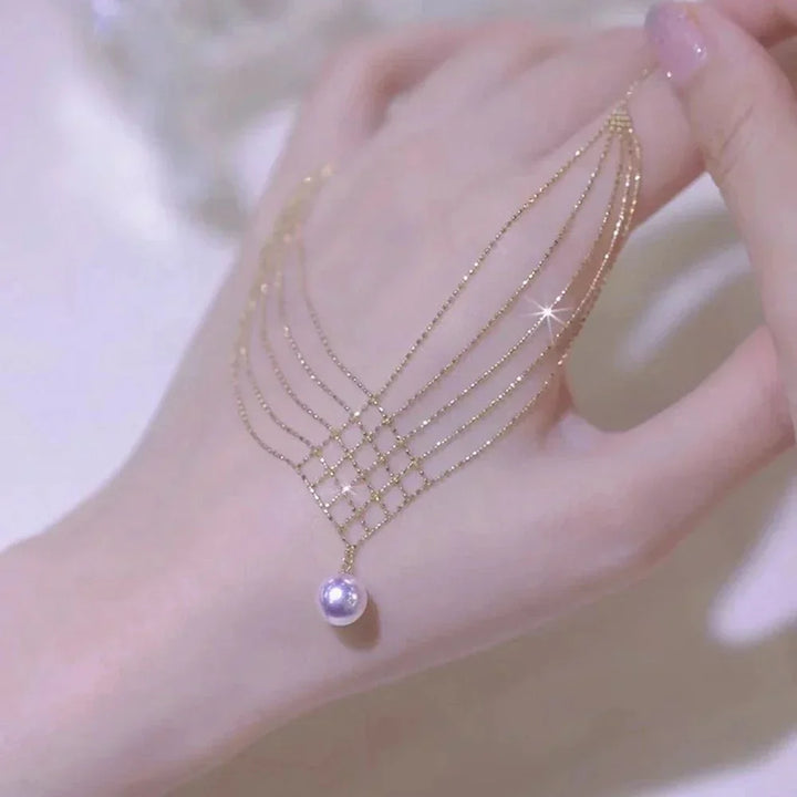 Elegant multi-layered pearl necklace for women, a stylish fashion accessory with classic design.