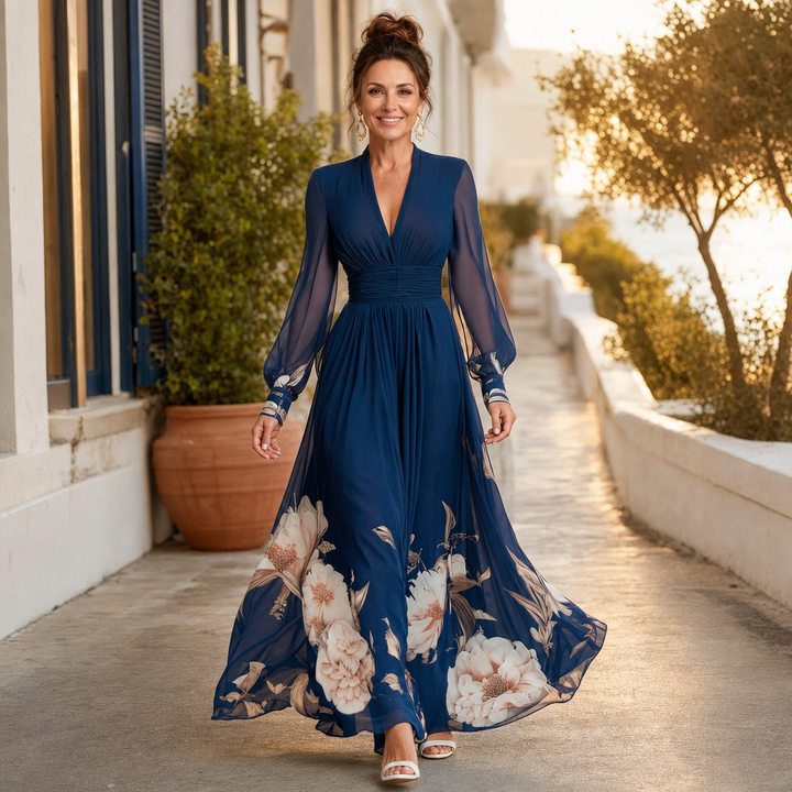 Women's flowy pleated maxi dress with a sophisticated V-neck and elegant sheer sleeves. Comfortable occasion wear.