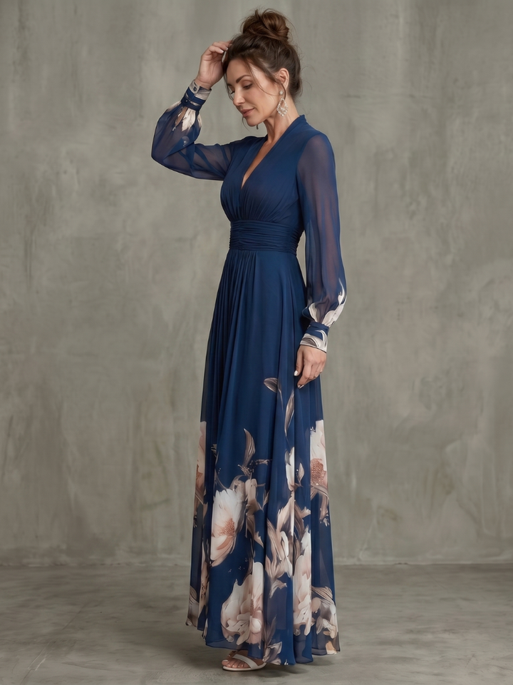 Beautiful women's elegant V-neck pleated maxi dress with sheer sleeves, ideal for special occasions. Flowy & comfortable.