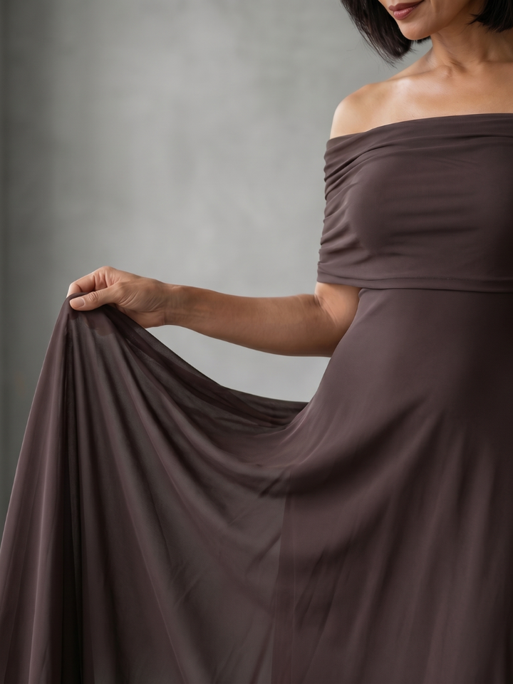 Coral pink off-shoulder midi dress with draped bodice, an elegant choice for special occasions & events.