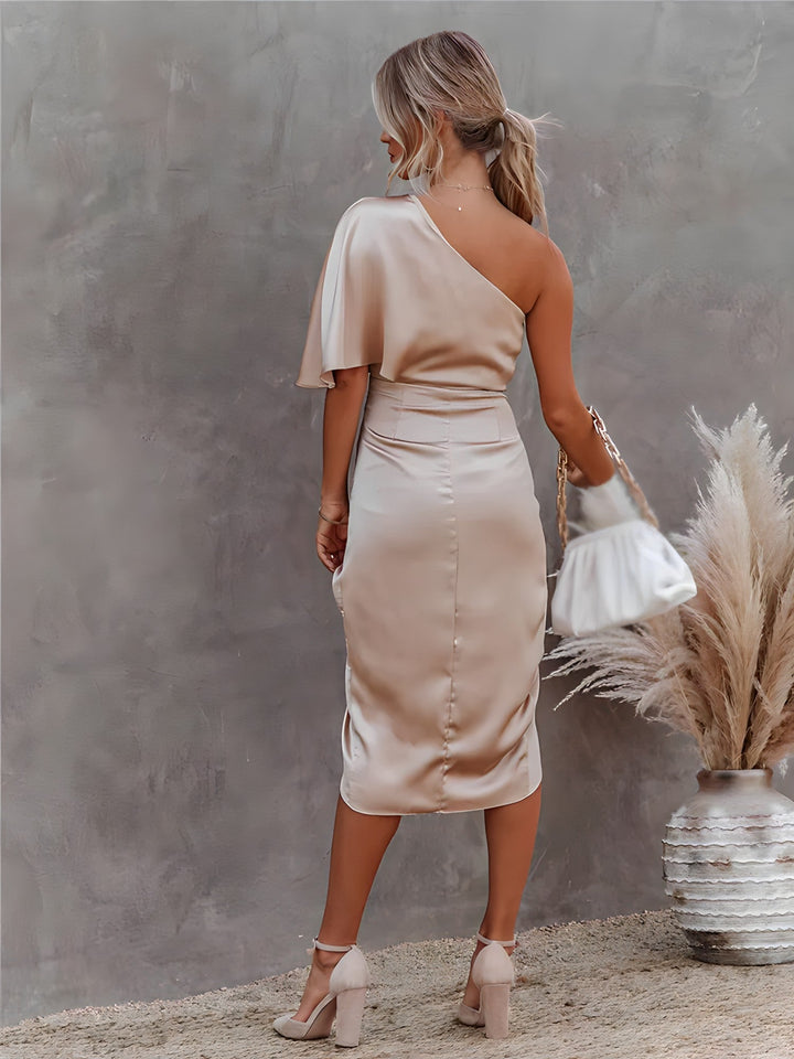 One-shoulder formal gown for special occasions. Elegant women's evening dress, sophisticated party wear.