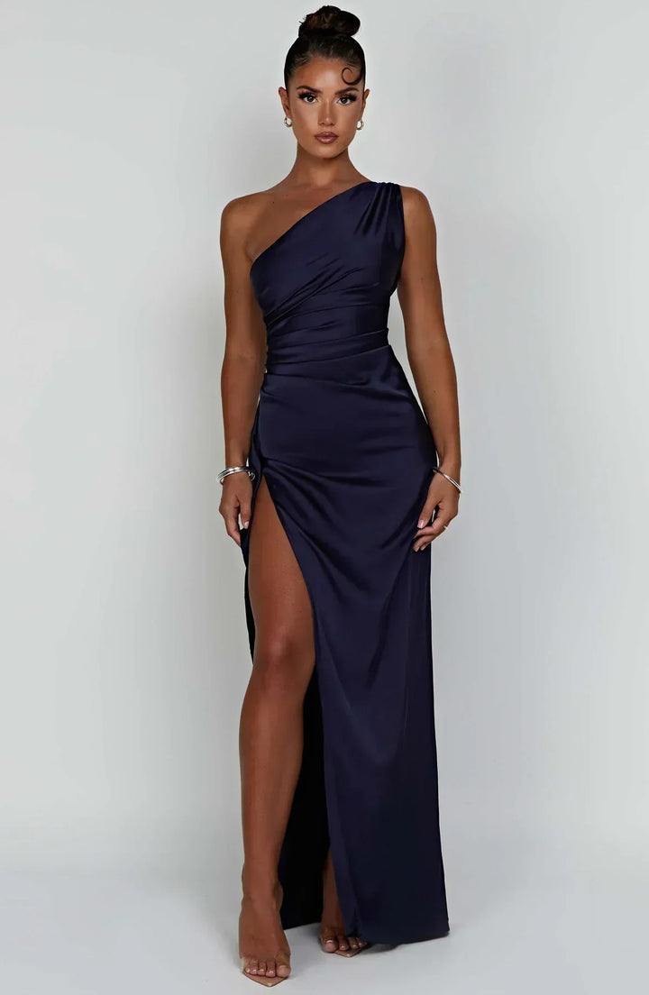 Modern women's one-shoulder party dress with an elegant split, perfect for special events.