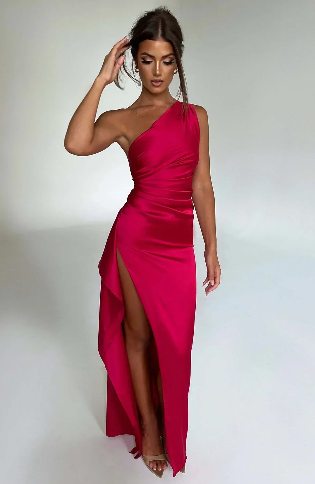 Elegant women's one-shoulder evening gown with a high split, perfect for making a statement.