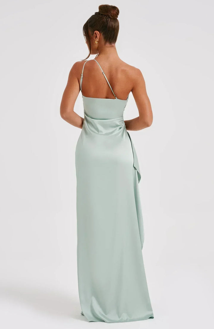 Luxurious women's one-shoulder evening dress with a graceful split, perfect for gala events.