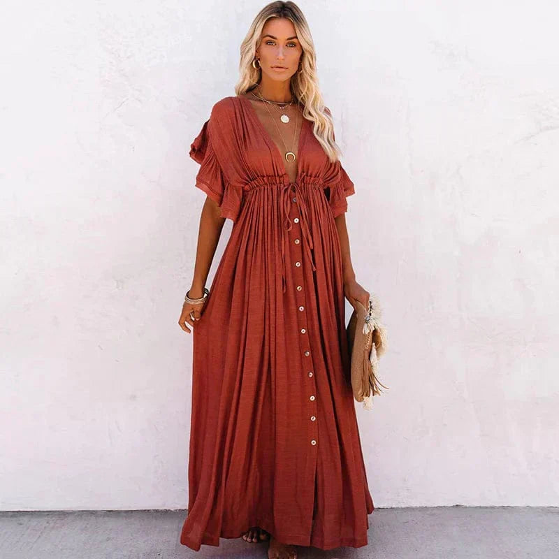 Elegant orange maxi beach dress for women, ideal for summer vacations & resort wear.