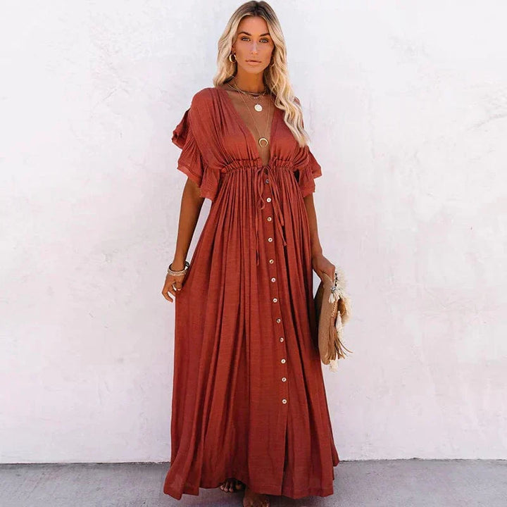 Elegant orange maxi beach dress for women, ideal for summer vacations & resort wear.