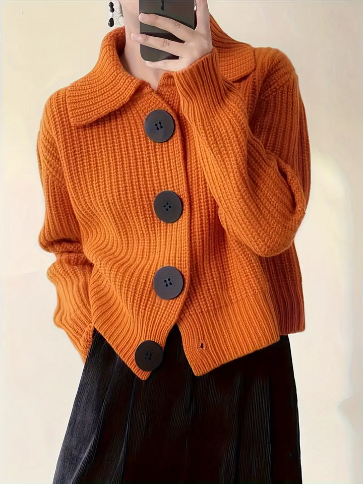 Elegant oversized button-down cardigan for women, a stylish layering piece for fall fashion.