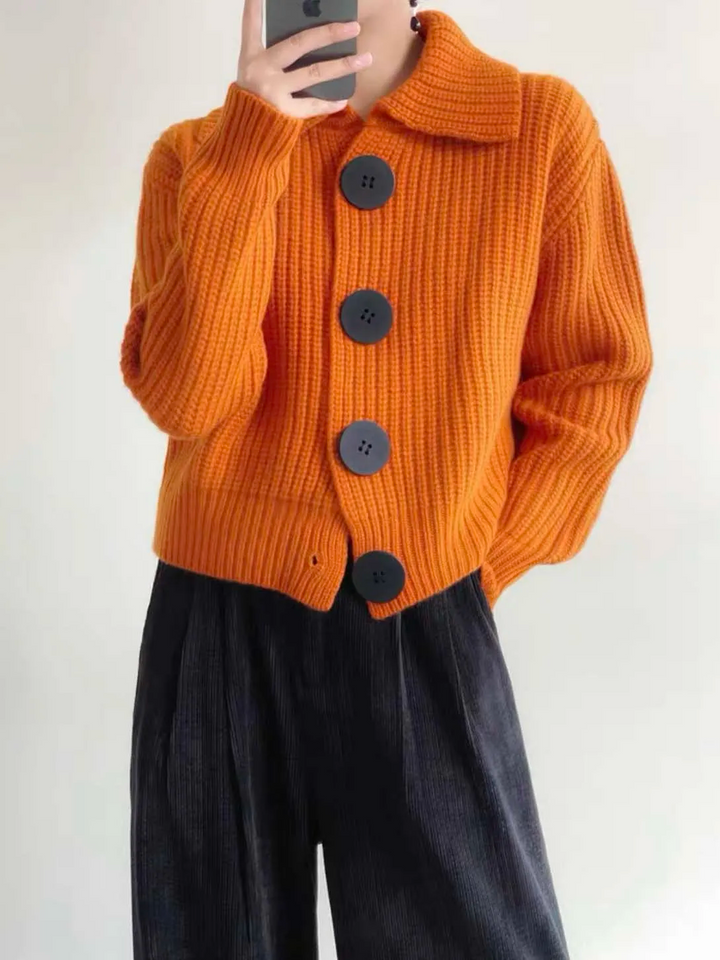 Women's casual oversized cardigan with wide collar and front buttons, versatile apparel.