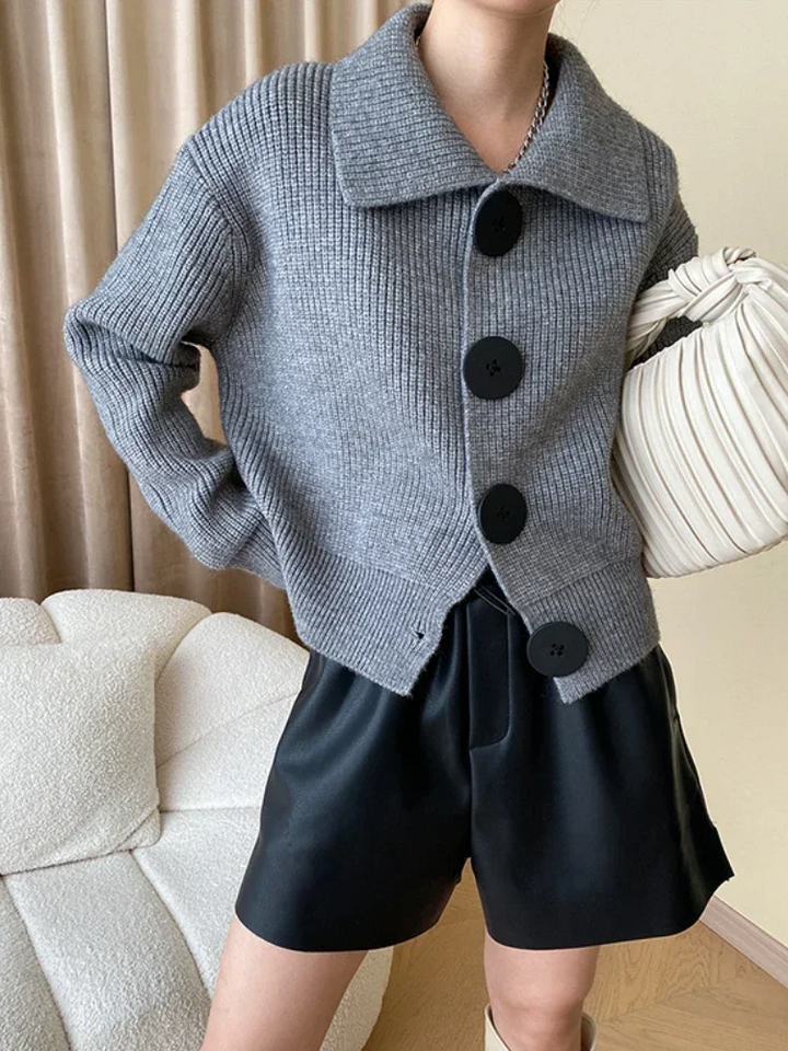 Versatile women's oversized button-down cardigan, comfortable and chic layering piece.