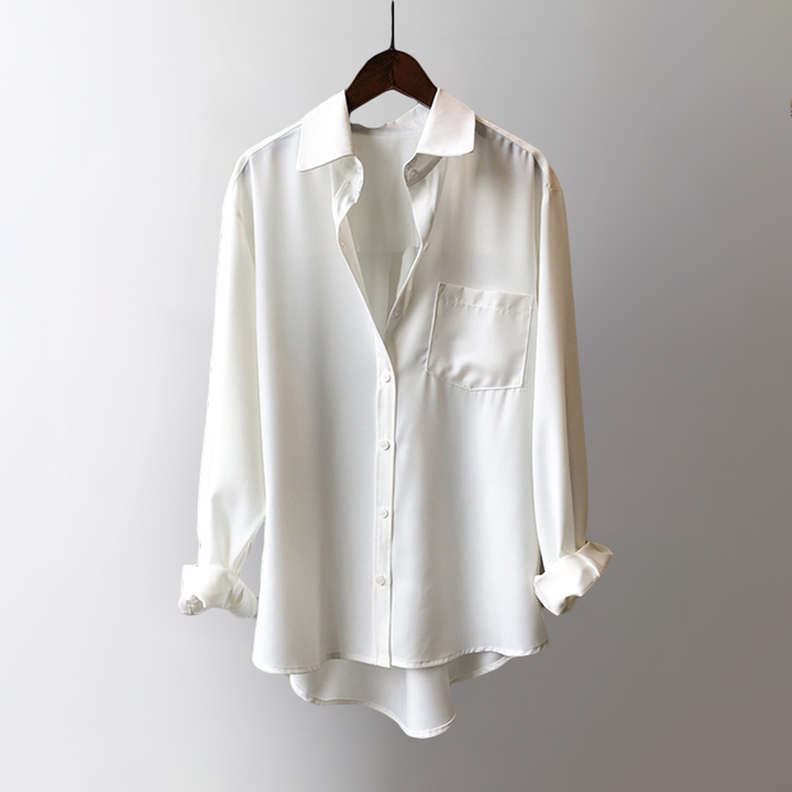 Elegant pearl white women's flowing blouse with long sleeves, perfect for sophisticated office or casual chic wear.