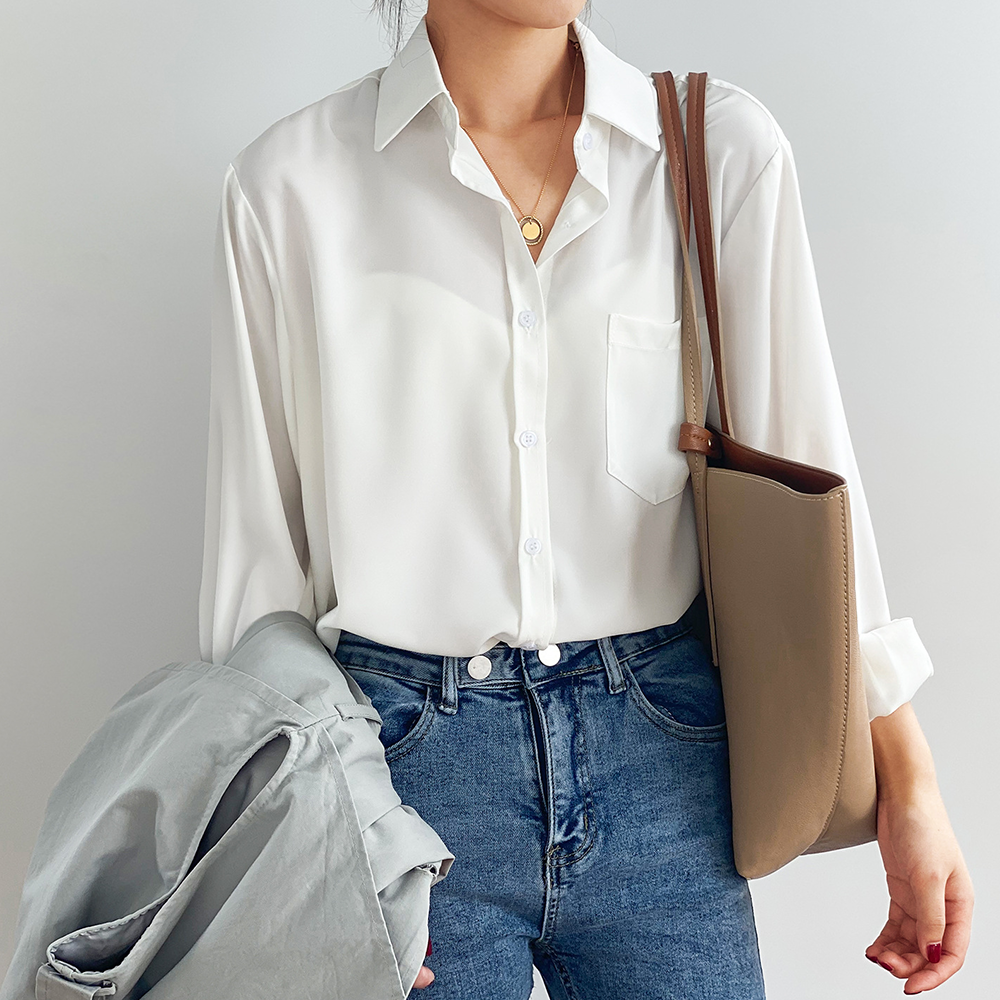 Versatile pearl white women's flowing shirt, a chic long-sleeve top perfect for both casual wear and elegant occasions.