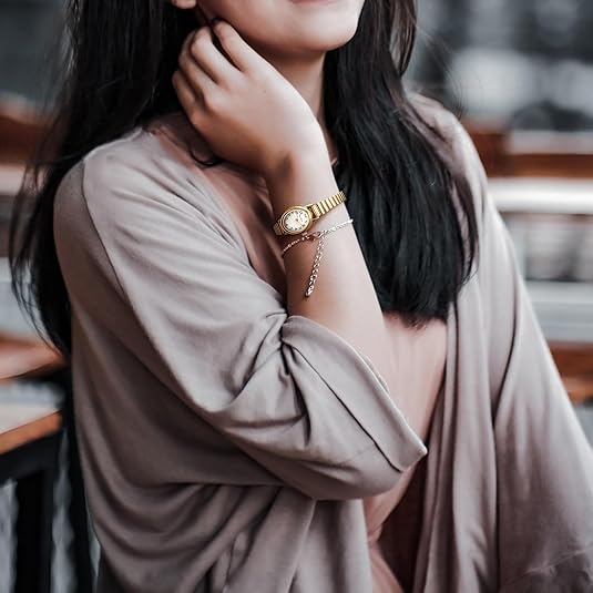 Women's elegant petite watch, Romy collection, gold-toned for a luxurious yet classic appeal.