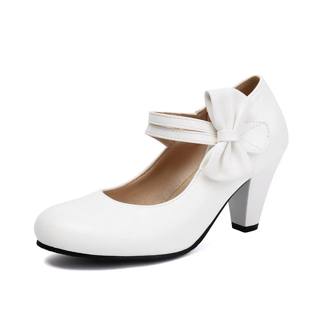 Comfortable women's block heels with a cute bow detail, perfect for everyday elegance or party wear.
