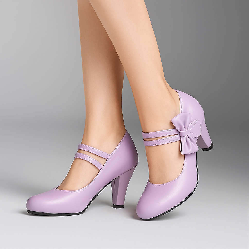 Formal black block heels with delicate bow and secure ankle strap, perfect for women's party wear.