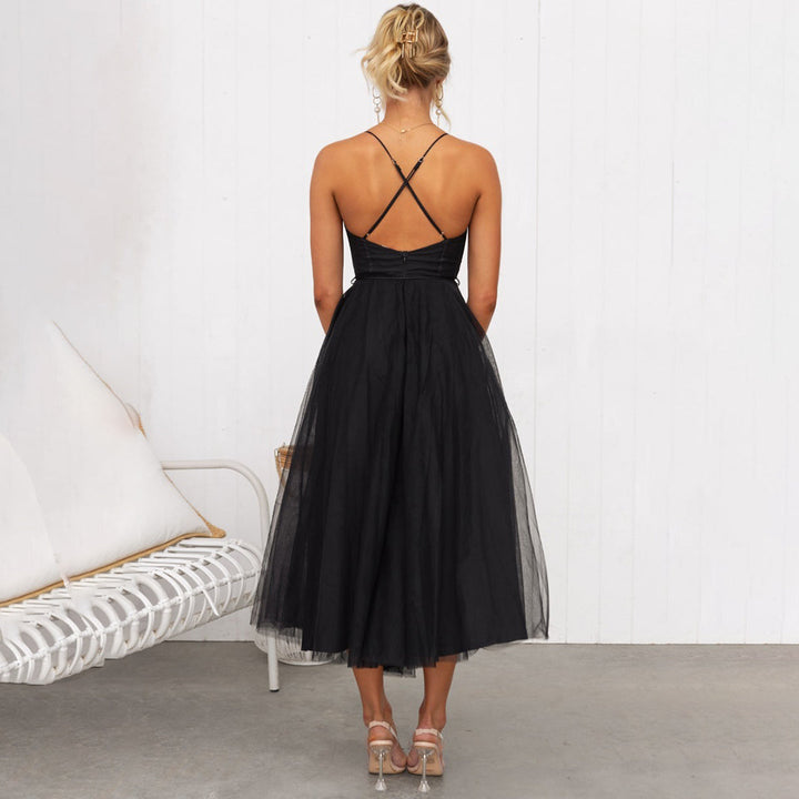 Pink cocktail midi dress for women. Elegant festive wear for special occasions, parties, and holidays.