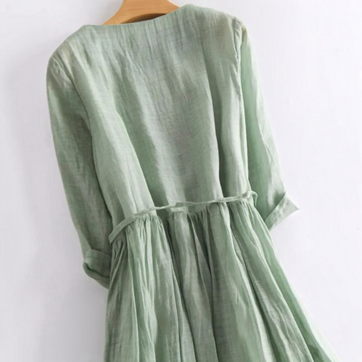 Soft pink women's elegant ruffle maxi dress, offering ultimate summer comfort, perfect for day outings.