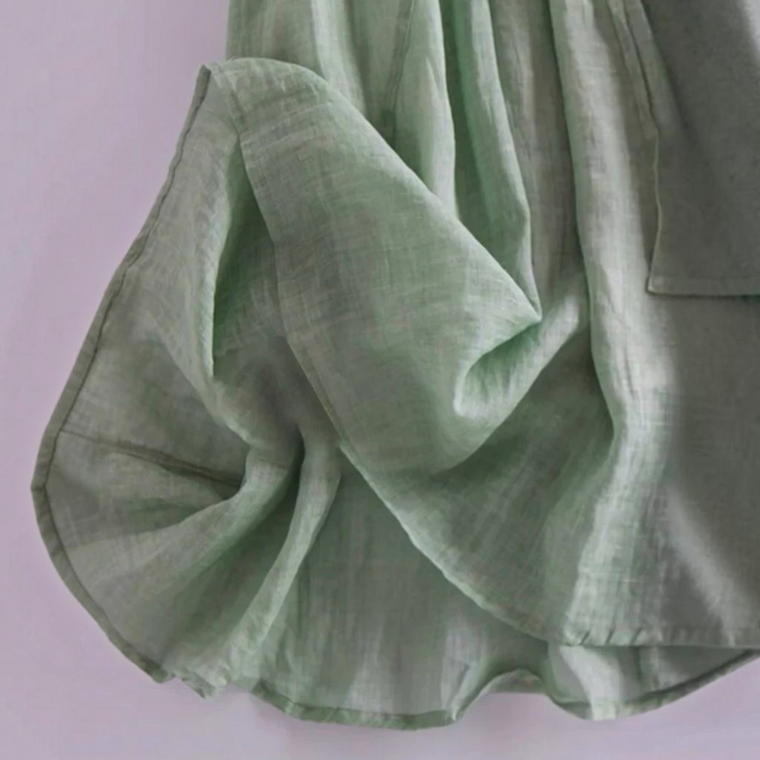 Stylish women's summer ruffle maxi dress in green, offering elegant comfort for any casual or beach outing.