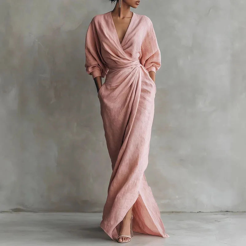 Elegant pink V-neck wrap maxi dress with long sleeves, perfect for women's evening wear or sophisticated casual.