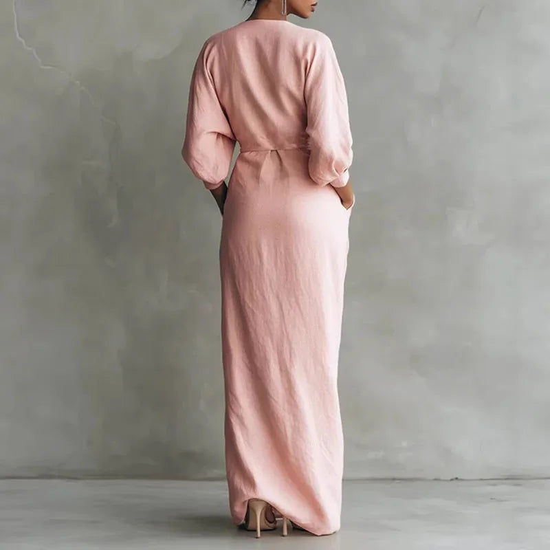 Sophisticated brown long sleeve V-neck wrap maxi dress, a flattering day-to-night women's bodycon style.