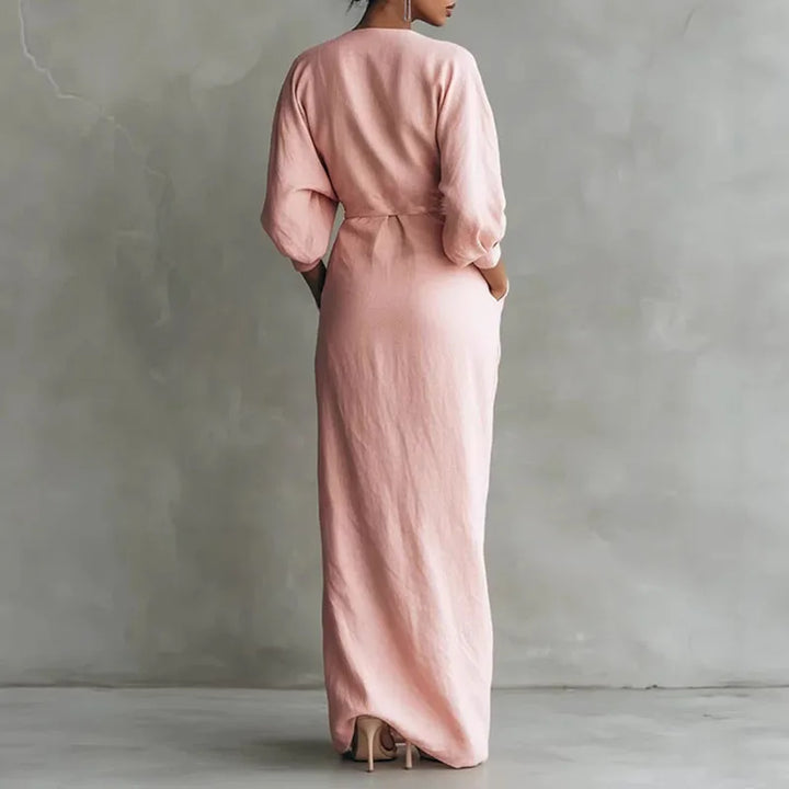 Sophisticated brown long sleeve V-neck wrap maxi dress, a flattering day-to-night women's bodycon style.