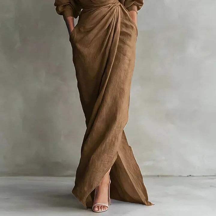 Flattering women's V-neck wrap maxi dress with long sleeves, ideal for elegant evening events or casual day wear.