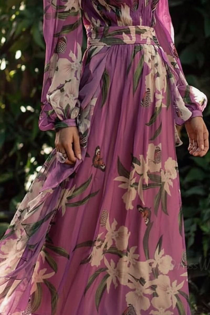 Flowing purple V-neck maxi dress for women, an elegant and comfortable choice for evening wear or a summer vacation.