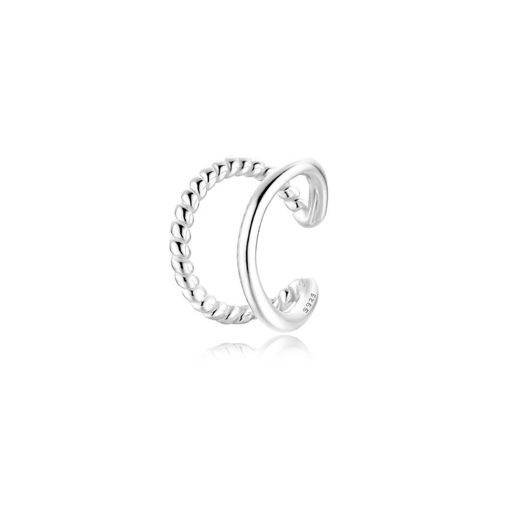 Chic women's rolled line ear cuff. Elegant and minimalist, this gold or silver-toned ear jewelry requires no piercing.
