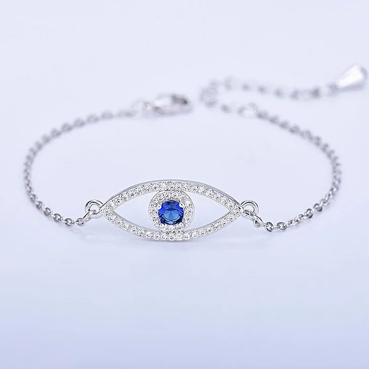 Elegant rose gold women's evil eye bracelet, a stylish protection talisman. Features a detailed blue nazar for good luck.
