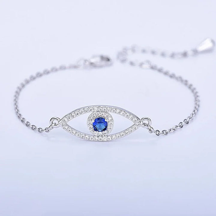 Elegant rose gold women's evil eye bracelet, a stylish protection talisman. Features a detailed blue nazar for good luck.