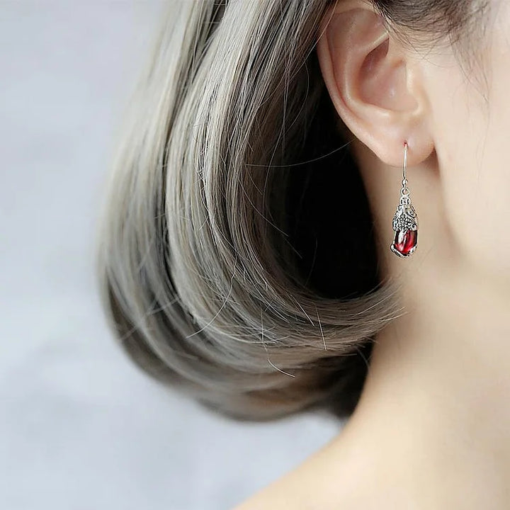 Elegant S925 silver mythical creature stud earrings for women, featuring a unique fantasy design & sparkling crystals.