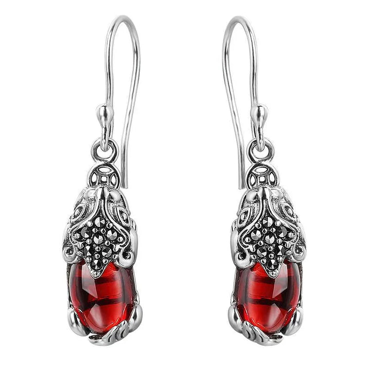 Unique Aelora mythical creature silver stud earrings for women, perfect fantasy jewelry gift with crystal accents.