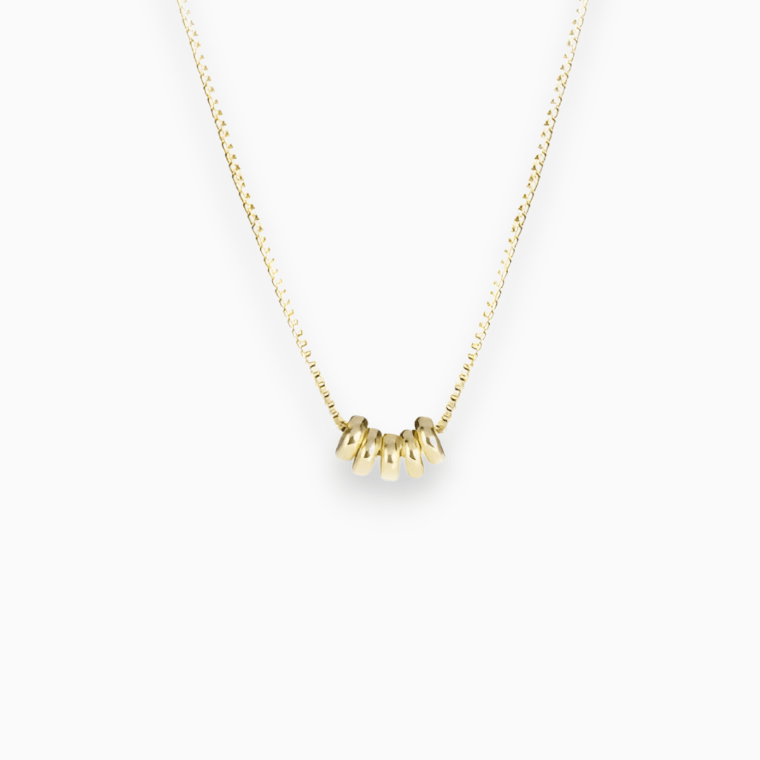 Elegant Seraphina women's charm necklace in lustrous gold and silver options, perfect for a chic fashion statement.