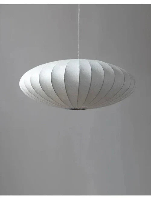 Luxurious SilkCrown crystal and silk pendant lamp, a chic modern ceiling light for ambient glow.