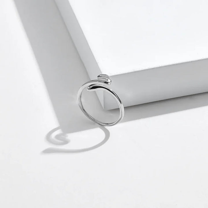 Women's adjustable snake ring, a unique fashion jewelry piece representing transformation. Ideal symbolic gift.