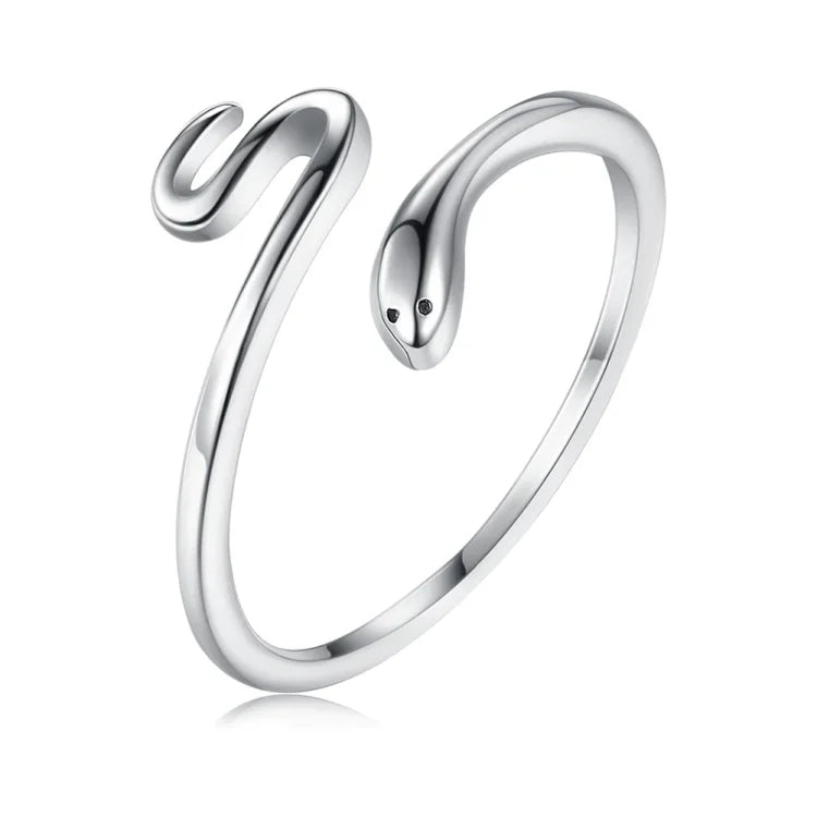 Close-up of a detailed adjustable snake ring for women, embodying transformation and rebirth. Trendy symbolic jewelry.