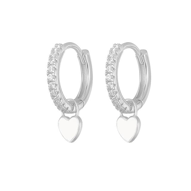 Versatile silver hoop earrings, a must-have in women's jewelry.