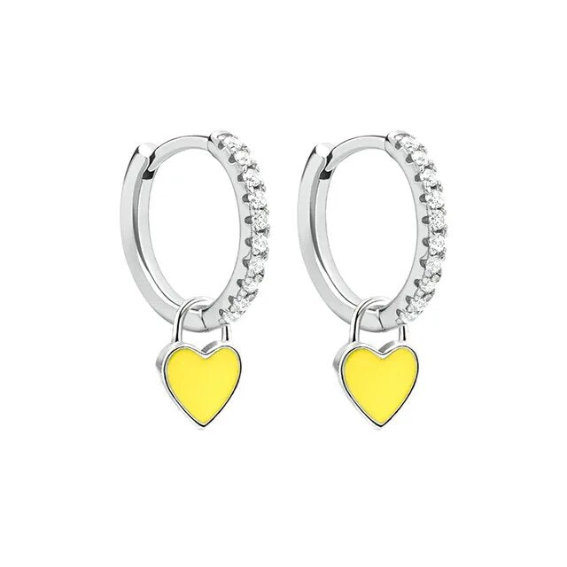 Refined silver-tone hoop earrings, sophisticated women's fashion.