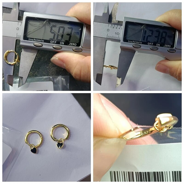 Modern women's fashion earrings, polished silver hoop design.