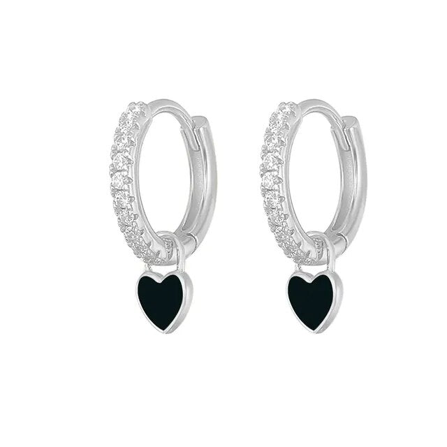 Sophisticated elegant silver hoops, a subtle statement piece.