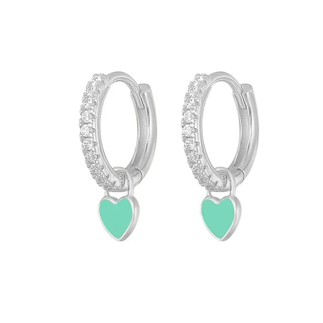 Delicate silver-tone hoops, essential women's fashion jewelry.