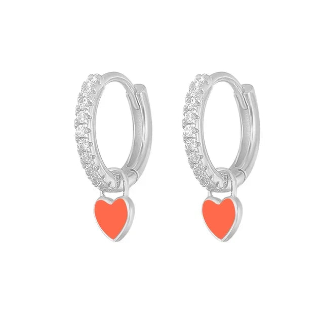 Fashionable silver hoop earrings, a versatile accessory for her.