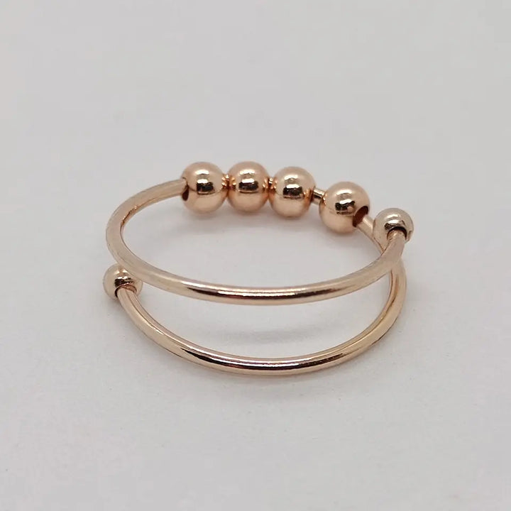 Stylish anti-stress spinner ring for women, offering discreet fidget relief & promoting calm mindfulness.