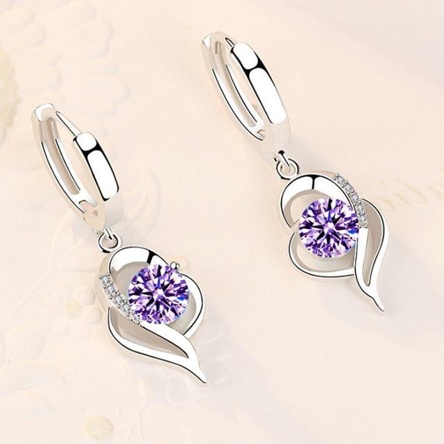 Sparkling silver zircon earrings, a beautiful gift for her. Women's elegant accessory with shining stones.