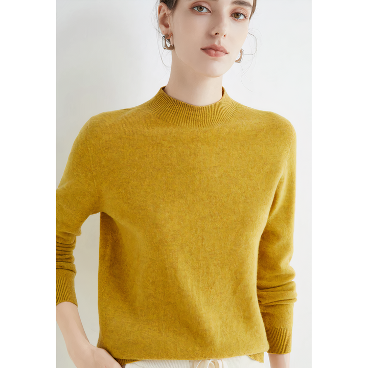 Luxury style soft knit long sleeve pullover sweater for women, offering elegant comfort in fall/winter fashion.