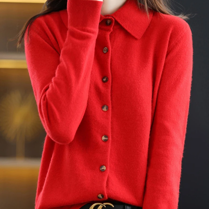 Soft women's elegant button-up collared top. Long-sleeve versatile apparel for workwear or casual everyday style.