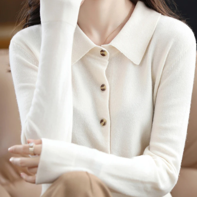 Everyday elegant soft women's long-sleeve button-up top. Versatile collared apparel for workwear or casual style.