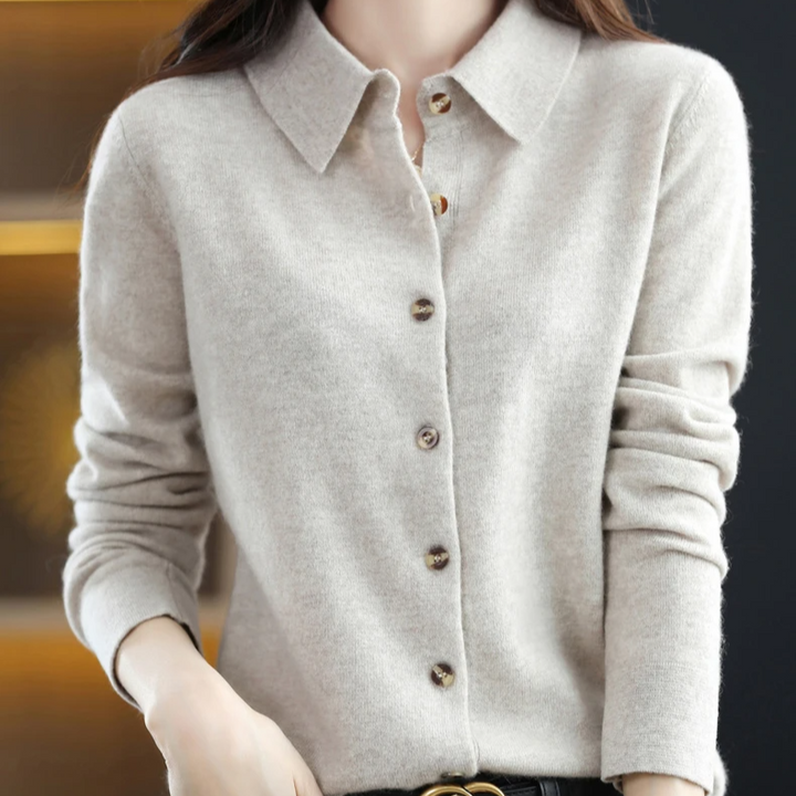 Versatile women's long-sleeve button-up top for casual or workwear. Elegant collared soft apparel for everyday fashion.
