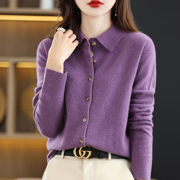 Women's collared button-up long-sleeve top in a soft fabric. Elegant workwear or casual fashion apparel for comfort.