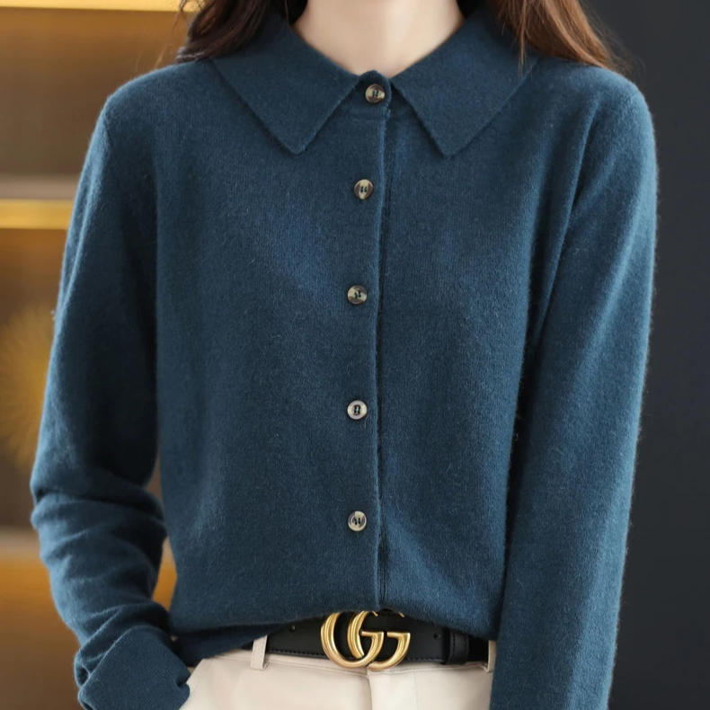 Women's elegant button-up collared top. Soft long-sleeve apparel, perfect for versatile everyday work or casual style.