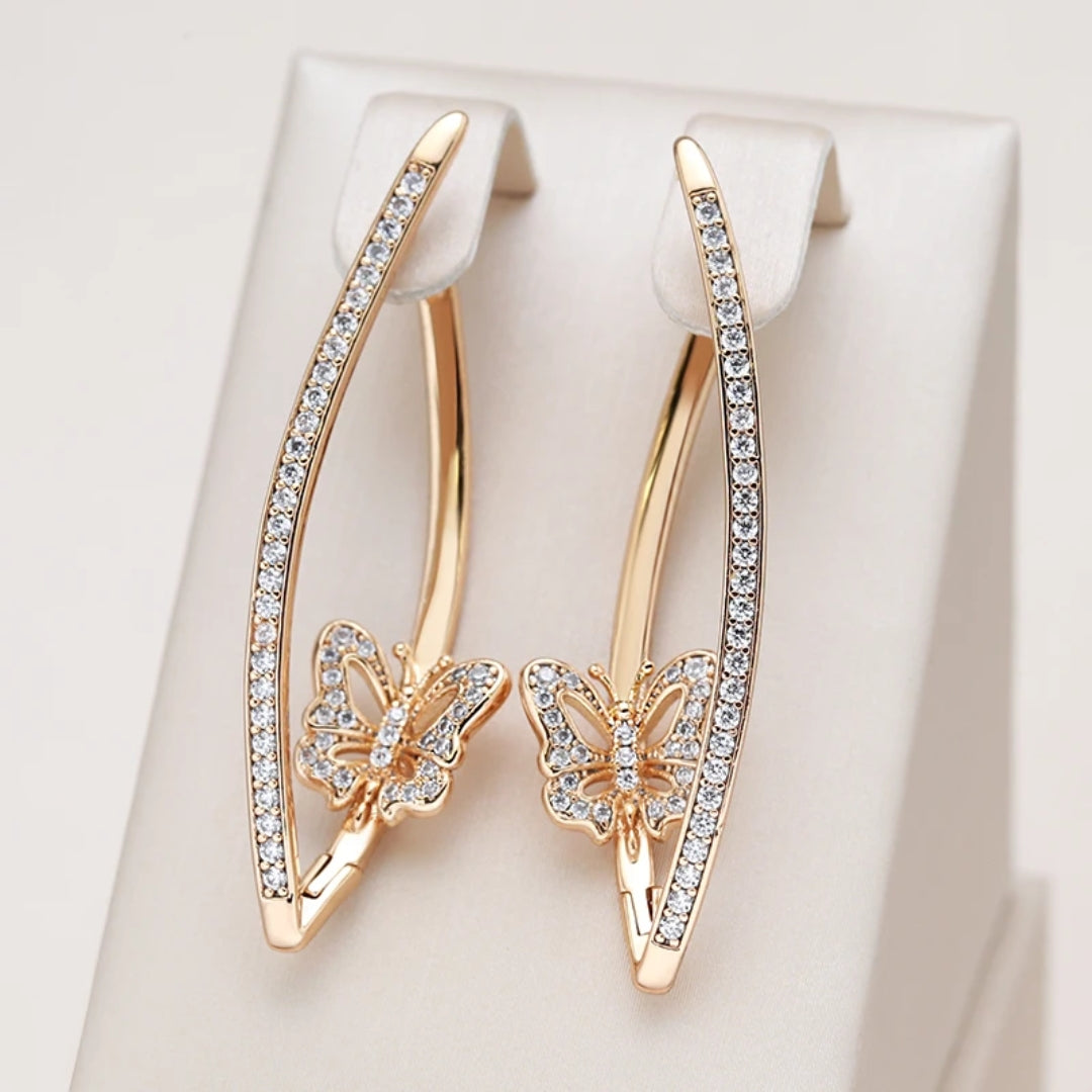 Elegant sparkling butterfly earrings for women, a delicate and enchanting fashion accessory perfect for any occasion.